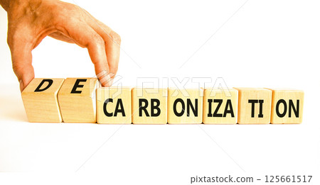 Decarbonization or carbonization symbol. Concept words Decarbonization or Carbonization on wooden blocks. Beautiful white background. Business decarbonization or carbonization concept. Copy space. Decarbonization or carbonization symbol. Concept words Decarbonization or Carbonization on wooden blocks. Beautiful white background. Business decarbonization or carbonization concept. Copy space. 125661517