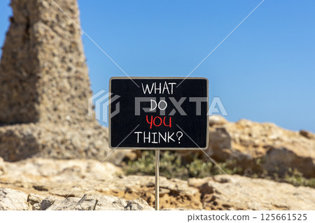 What do you think symbol. Concept words What do you think on beautiful black blackboard. Beautiful stone and blue sky background. Business and What do you think concept. Copy space. What do you think symbol. Concept words What do you think on beautiful black blackboard. Beautiful stone and blue sky background. Business and What do you think concept. Copy space. 125661525