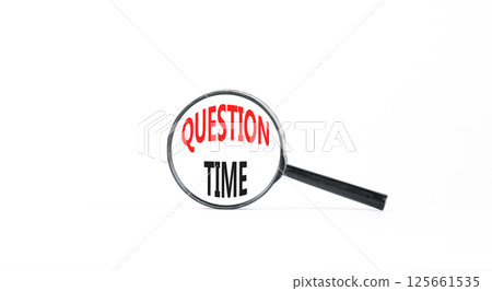 Question time symbol. Concept words Question time on beautiful white paper in magnifying glass. Beautiful white paper background. Business and question time concept. Copy space. Question time symbol. Concept words Question time on beautiful white paper in magnifying glass. Beautiful white paper background. Business and question time concept. Copy space. 125661535