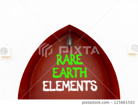 Rare earth elements symbol. Concept words Rare earth elements on beautiful white and red wall. Beautiful white and red wall background. Business and rare earth elements concept. Copy space. 125661583
