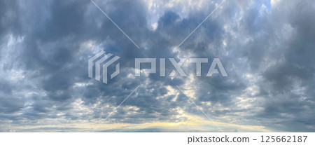 Stormy sky with cloud and sun light. Nature background, skyline landscape 125662187
