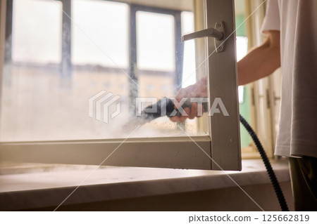 Experience Professional Window Cleaning with Advanced Steam Technology for Pristine Results 125662819