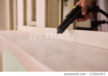 Experience Professional Window Cleaning with Advanced Steam Technology for Pristine Results 125662823
