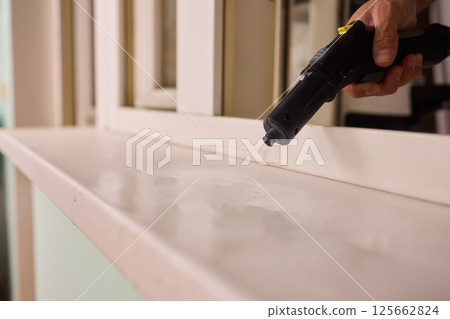 Experience Professional Window Cleaning with Advanced Steam Technology for Pristine Results 125662824