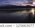 Blushed skies and still waters a pink sunset dream 125663077
