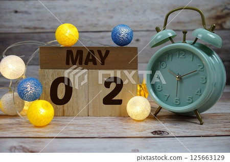 Wooden Calendar Showing the Date of May 2nd. Day 2 of May month 125663129