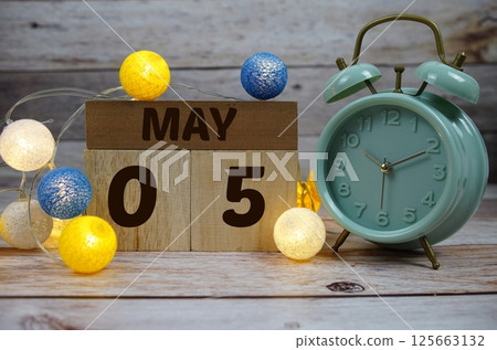 Wooden Calendar Showing the Date of May 5th. Day 5 of May month 125663132