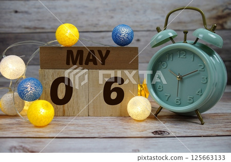 Wooden Calendar Showing the Date of May 6th. Day 6 of May month 125663133
