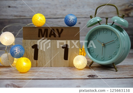 Wooden Calendar Showing the Date of May 11th. Day 11 of May month 125663138