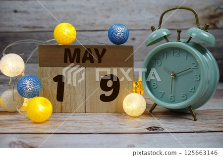 Wooden Calendar Showing the Date of May 19th. Day 19 of May month Wooden Calendar Showing the Date of May 19th. Day 19 of May month 125663146