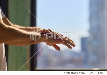 Applying Skincare Cream Daily on Hands for Achieving Healthy, Hydrated, and Radiant Skin Care 125663283