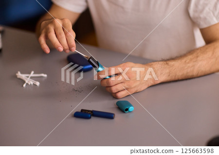 To enjoy a quality vaping session, properly prepare the vape device with ground material To enjoy a quality vaping session, properly prepare the vape device with ground material 125663598