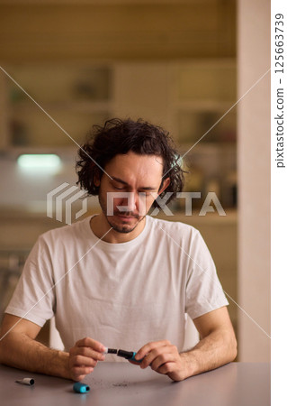 To enjoy a quality vaping session, properly prepare the vape device with ground material To enjoy a quality vaping session, properly prepare the vape device with ground material 125663739