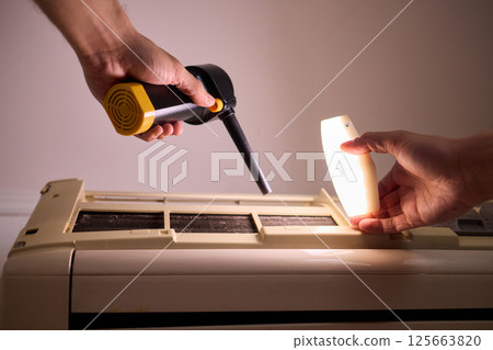 Hands are Actively Engaged in Various Tasks such as Air Conditioning Repair and Ongoing Maintenance Hands are Actively Engaged in Various Tasks such as Air Conditioning Repair and Ongoing Maintenance 125663820