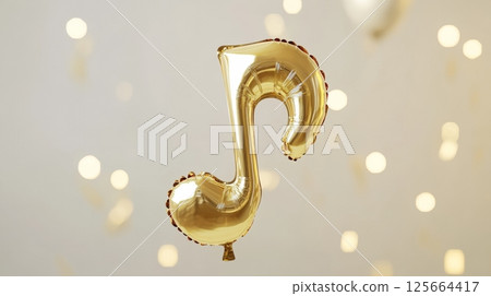 Gold musical note balloon floating among lights, festive decoration concept 125664417