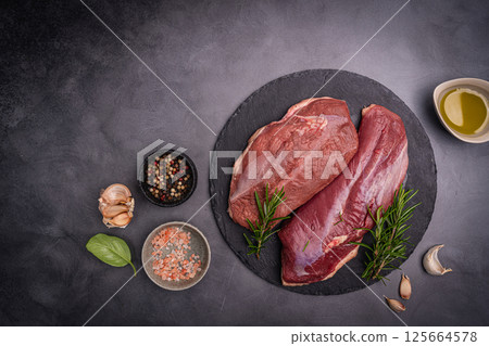 Preparation for cooking raw duck breast Preparation for cooking raw duck breast 125664578