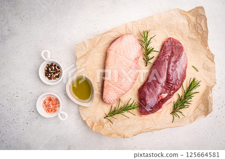 Preparation for cooking raw duck breast Preparation for cooking raw duck breast 125664581