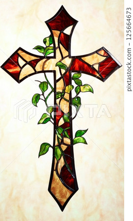 Stained glass cross with vine design, artistic craftsmanship. Religious and decorative art concept 125664673