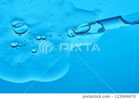 A pipette with a juicy gel texture. 125664678