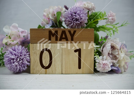 Wooden Calendar Showing the Date of May 1st. Day 1 of May month Wooden Calendar Showing the Date of May 1st. Day 1 of May month 125664815