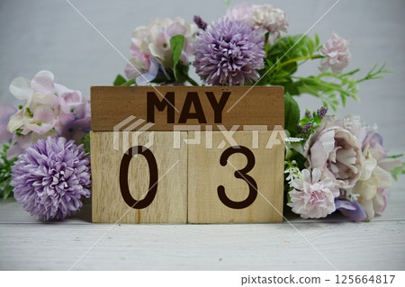 Wooden Calendar Showing the Date of May 3rd. Day 3 of May month 125664817