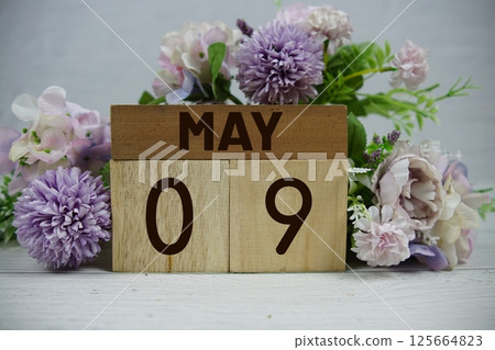 Wooden Calendar Showing the Date of May 9th. Day 9 of May month Wooden Calendar Showing the Date of May 9th. Day 9 of May month 125664823
