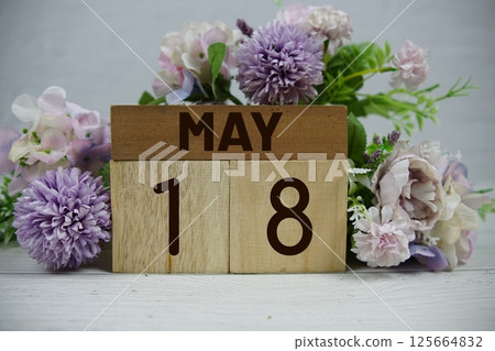 Wooden Calendar Showing the Date of May 18th. Day 18 of May month 125664832