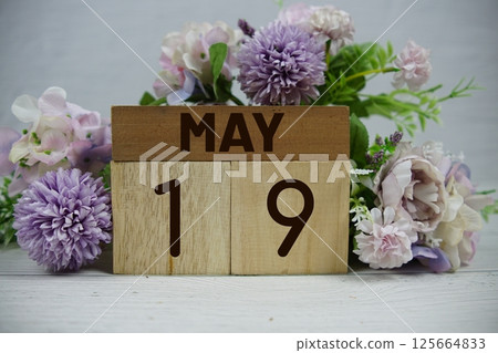 Wooden Calendar Showing the Date of May 19th. Day 19 of May month Wooden Calendar Showing the Date of May 19th. Day 19 of May month 125664833
