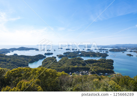 View of the Kujukushima Islands and the blue sea from Tenkaiho View of the Kujukushima Islands and the blue sea from Tenkaiho 125666289