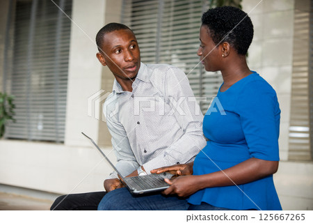 portrait of young people with laptop. 125667265