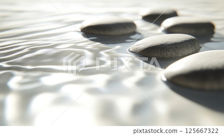 Smooth zen stones on rippling water surface, 3d rendering of tranquility concept 125667322