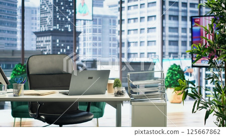 Empty high end corporation workspace with modern tools and gadgets that serve in the business industry. Corporate culture concept, career development with executive power. Empty high end corporation workspace with modern tools and gadgets that serve in the business industry. Corporate culture concept, career development with executive power. 125667862