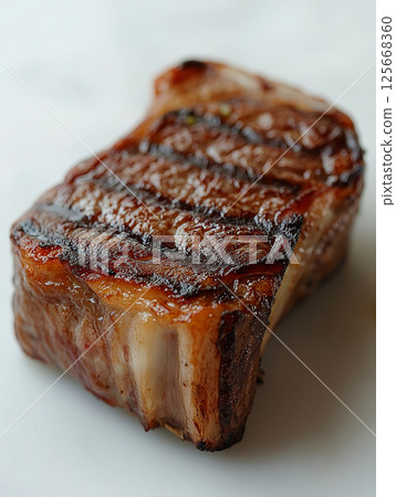 Juicy grilled steak and meat for a delicious beef dinner with protein-rich food 125668360