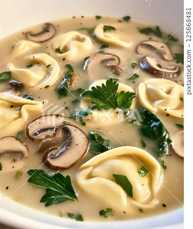 Tortellini Soup with Creamy Mushroom and Parmesan, Italian Pasta Garnish 125668481