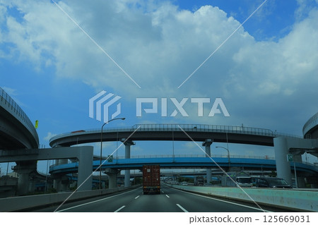 Car running on highway 125669031