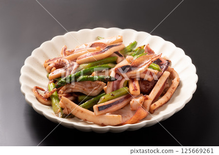 Squid and asparagus grilled with butter and soy sauce Squid and asparagus grilled with butter and soy sauce 125669261