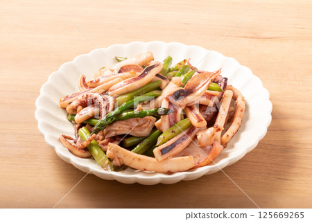 Squid and asparagus grilled with butter and soy sauce Squid and asparagus grilled with butter and soy sauce 125669265