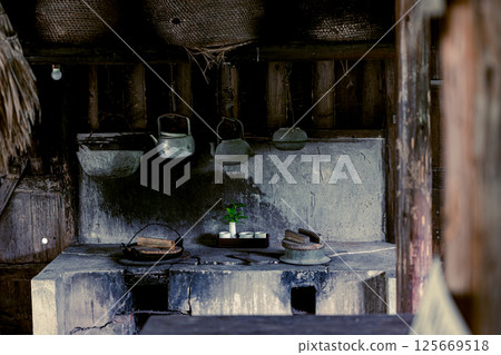 A rustic kitchen where Ishigaki Island traditions live on 125669518