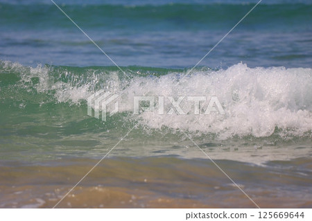 beautiful sandy beach and blue sea 125669644