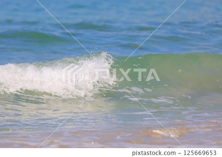beautiful sandy beach and blue sea 125669653