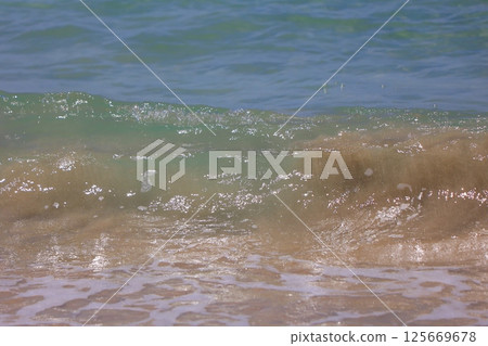 beautiful sandy beach and blue sea 125669678