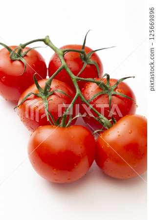 Bunch of tomatoes Bunch of tomatoes 125669896