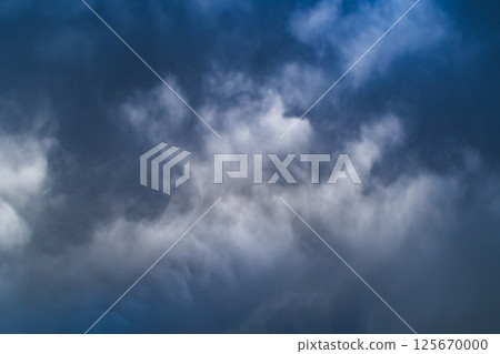 Background of rain clouds covering the sky High saturation and contrast 125670000