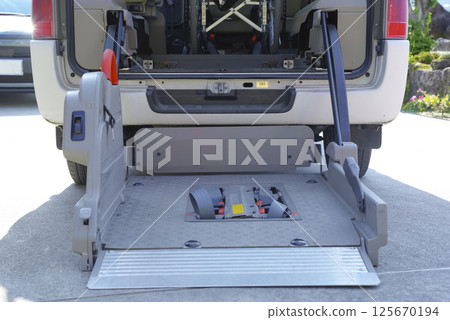 Welfare vehicle with wheelchair lift Welfare vehicle with wheelchair lift 125670194