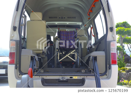 Welfare vehicle with wheelchair lift Welfare vehicle with wheelchair lift 125670199
