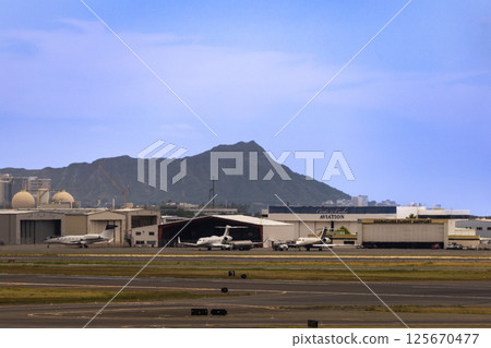 Holidays in Hawaii: View of downtown Honolulu and Diamond Head from Honolulu International Airport 125670477
