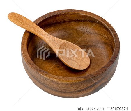 Wooden bowl with spoon isolated. Wooden bowl with spoon isolated. 125670874