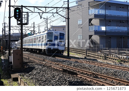 Tobu Urban Park Line train running in Iwatsuki Ward, Saitama City Tobu Urban Park Line train running in Iwatsuki Ward, Saitama City 125671873