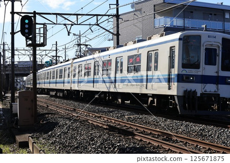 Tobu Urban Park Line train running in Iwatsuki Ward, Saitama City 125671875