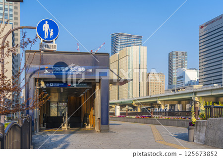 Morning in Osaka: Keihan Railway Oebashi Station and Nakanoshima skyscrapers Morning in Osaka: Keihan Railway Oebashi Station and Nakanoshima skyscrapers 125673852